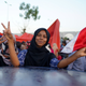 People chant slogans during a protest outside of the Military headquarters in Khartoum, Sudan, 13 April 2019. According to reports, thousands of Sudanese people demonstrated in front of the Military headquarters in Khartoum demanding that former President Omar al-Bashir face trial, as well as the military-led transitional council. Sudanese defense minister and head of Sudan's military council, Awad Ibn Auf, stepped down a day after leading a military coup that ousted long-time leader Omar al-Bashir amid a wave of protests. Awad Ibn Auf named Lt. Gen. Abdel Fattah Abdelrahman Burhan as his successor. A military-led transitional council will stay in power for two years followed by elections, the army said. Protests continue in Sudan, Khartoum - 13 Apr 2019